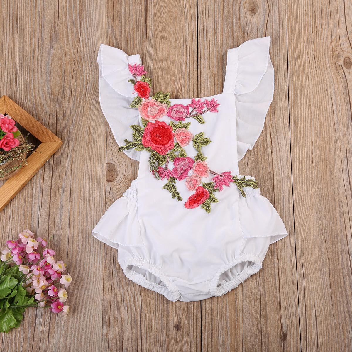 Barboteuse à fleurs pour bébé