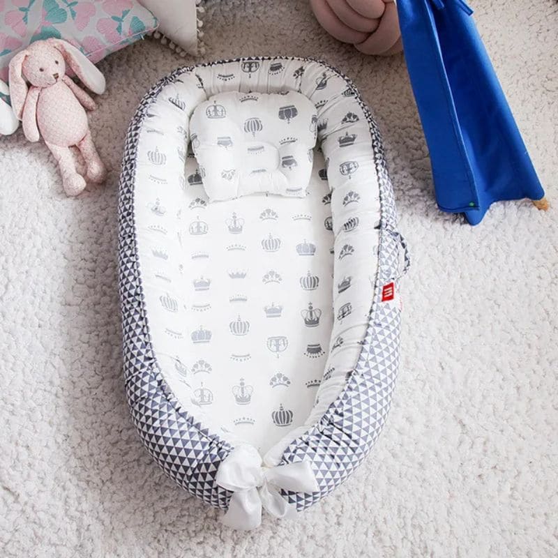 Réducteur de Lit Bébé - Sécurité et Confort | DreamCocoon