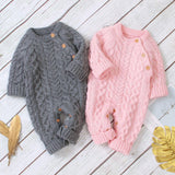 Combinaison pour bébé en tricot de couleur unie