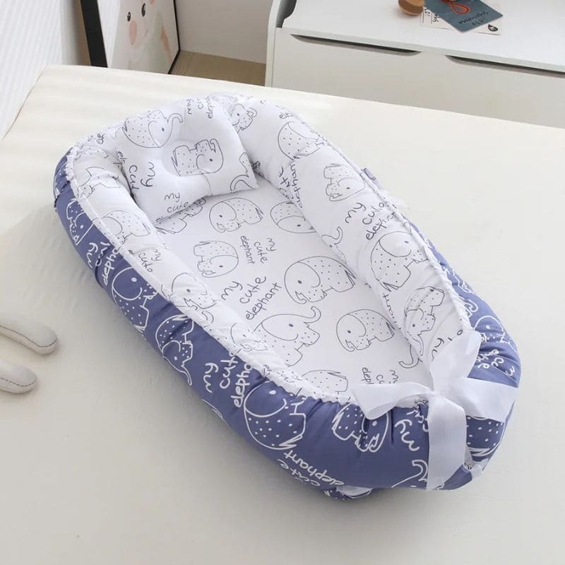 Réducteur de Lit Bébé - Sécurité et Confort | DreamCocoon