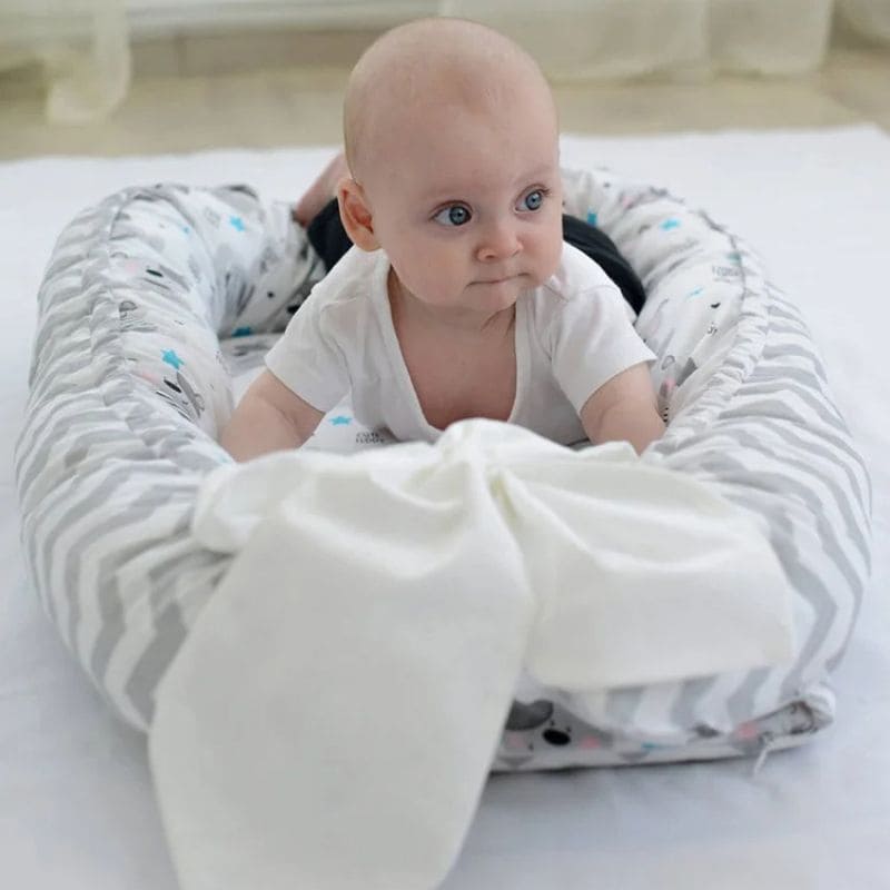 Réducteur de Lit Bébé - Sécurité et Confort | DreamCocoon