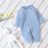 Combinaison pour bébé en tricot de couleur unie