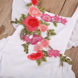 Barboteuse à fleurs pour bébé