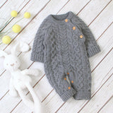 Combinaison pour bébé en tricot de couleur unie