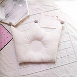 Coussin en mousse anti-tête plate pour bébé