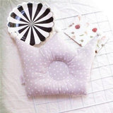 Coussin en mousse anti-tête plate pour bébé