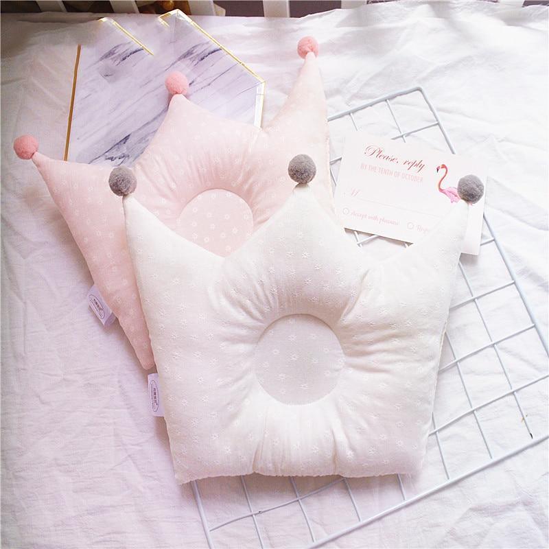 Coussin en mousse anti-tête plate pour bébé