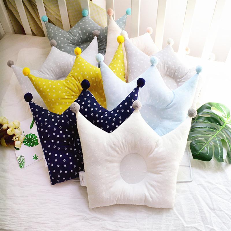 Coussin en mousse anti-tête plate pour bébé