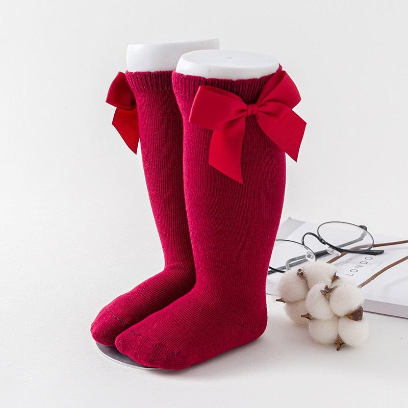 Paire de chaussette rouge avec noeuds de papillon pour bébé