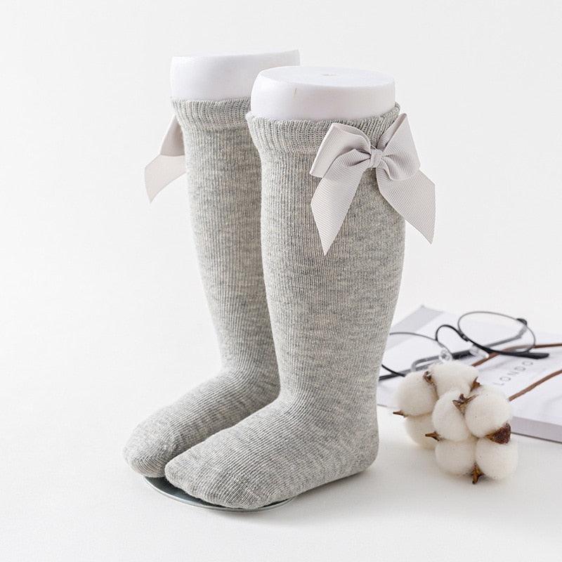 Paire de chaussette grise avec noeuds de papillon