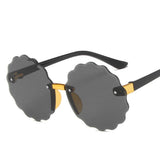 Lunettes de soleil rondes en forme de vague de fleurs pour enfants
