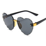 Lunettes de soleil en coeur sans bordure pour enfants