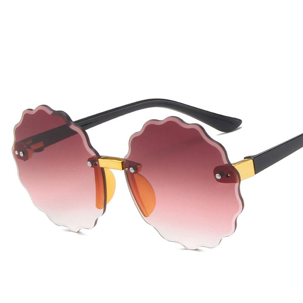 Lunettes de soleil rondes en forme de vague de fleurs pour enfants