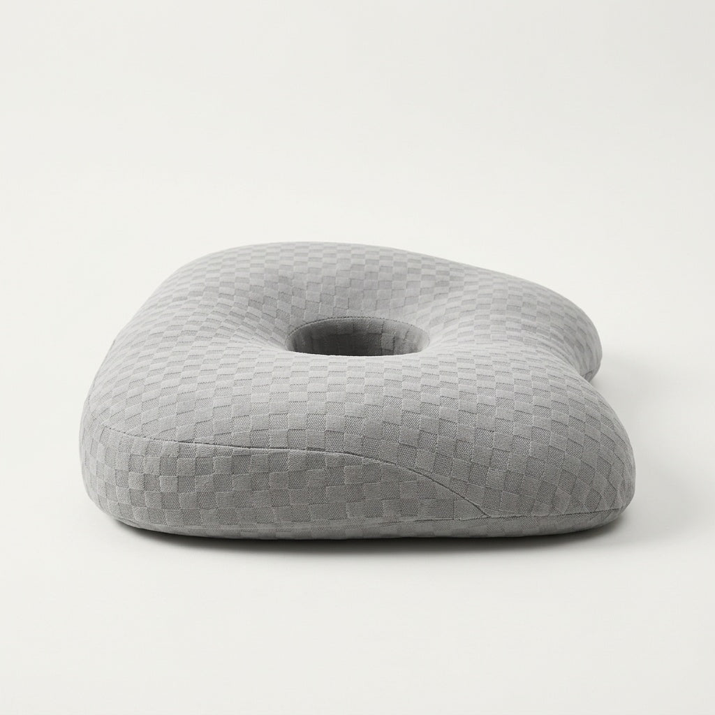 Oreiller ergonomique à trou pour oreille