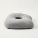 Oreiller ergonomique à trou pour oreille