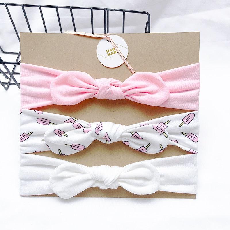 Bandeau fille rose et blanc avec motifs (lot de 3)