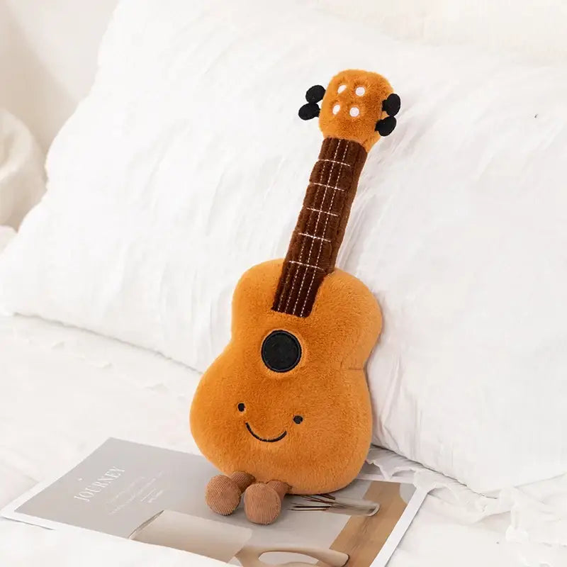 Peluche Instrument de musique 30cm