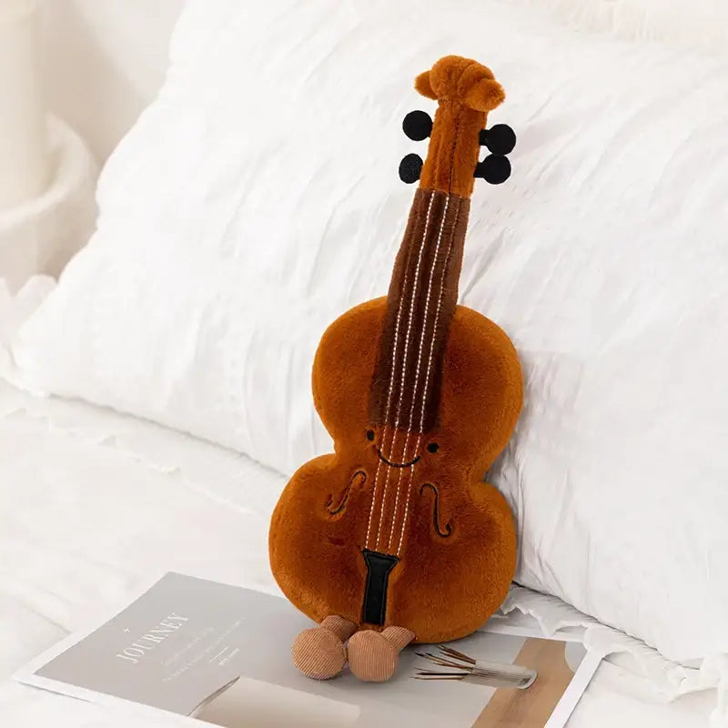 Peluche Instrument de musique 30cm